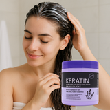 Woman applying lavender keratin hair mask for healthy scalp and damaged hair repair in bathroom setting.